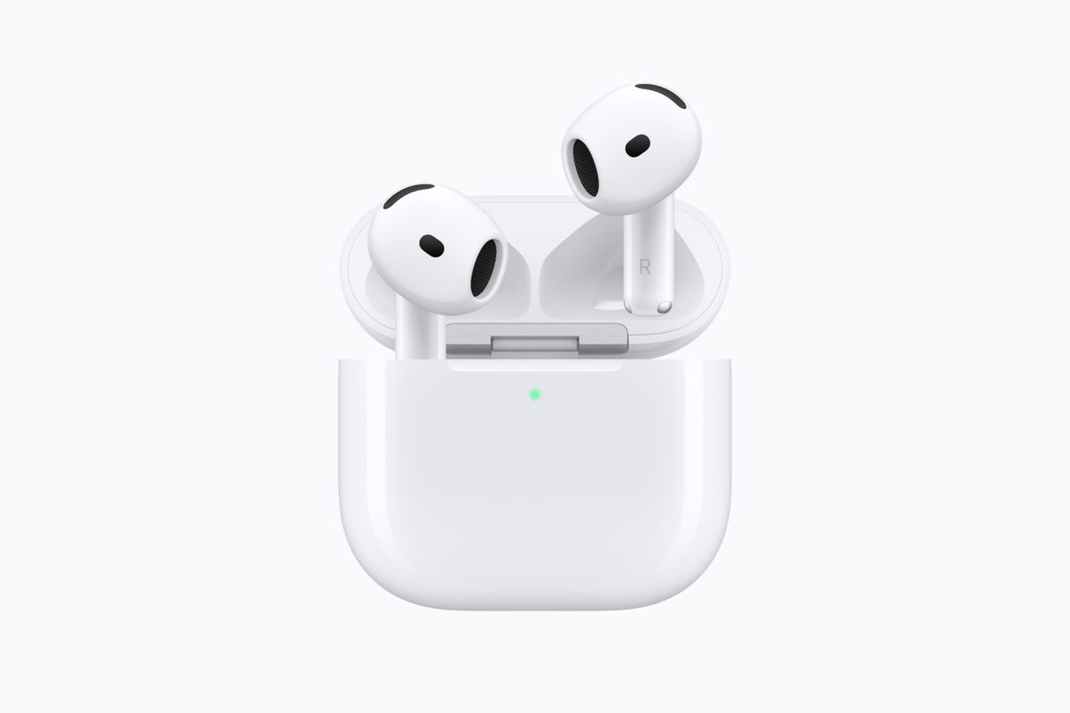 Apple AirPods 5 earbuds above their open white charging case