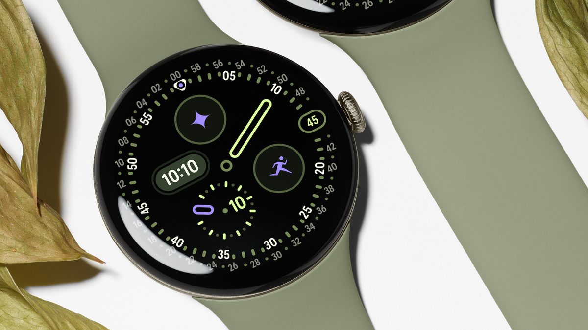 Google Pixel Watch 5 close-up on an olive Active Band, showing its domed Actua 360 display