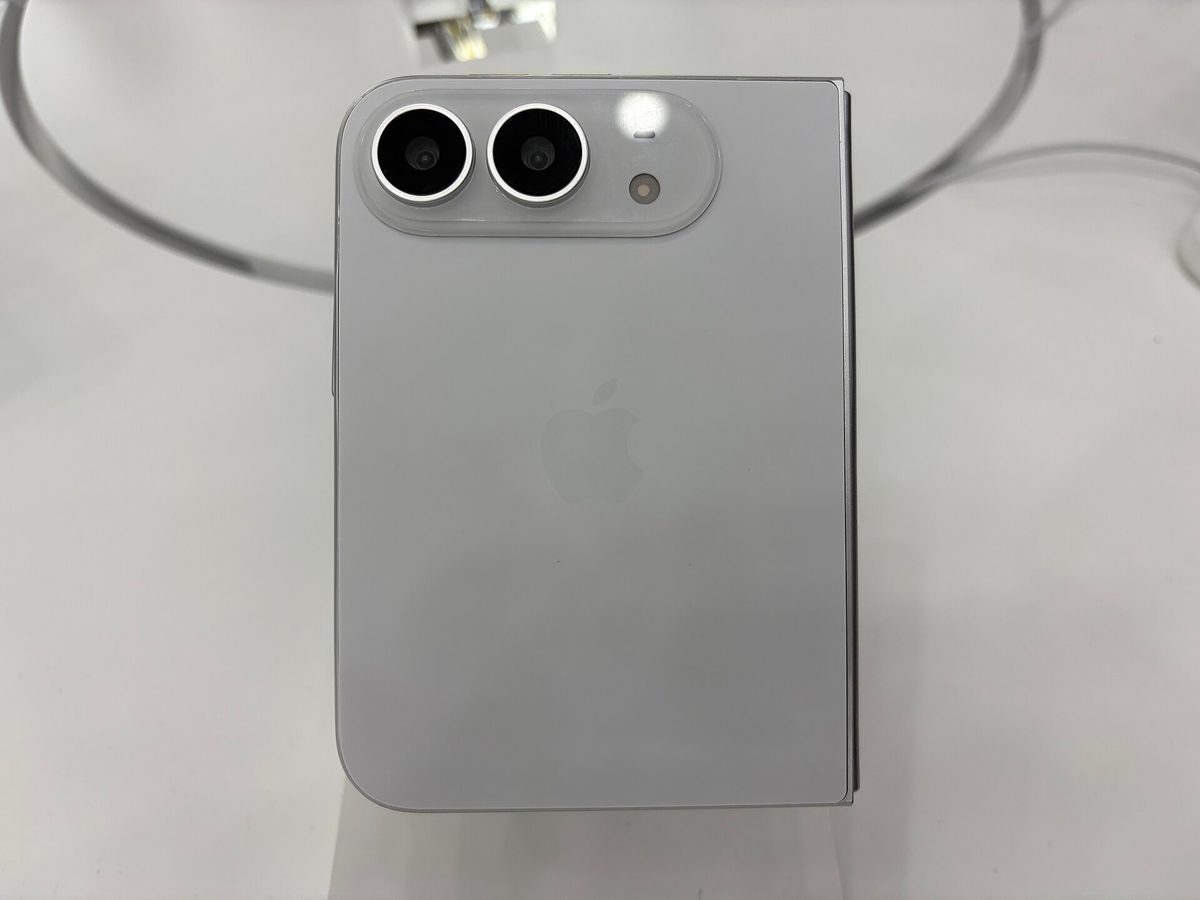 The rear of the iPhone Duo, Apple's first folding iPhone, showing its dual-camera module and the hinge seam of its folding body
